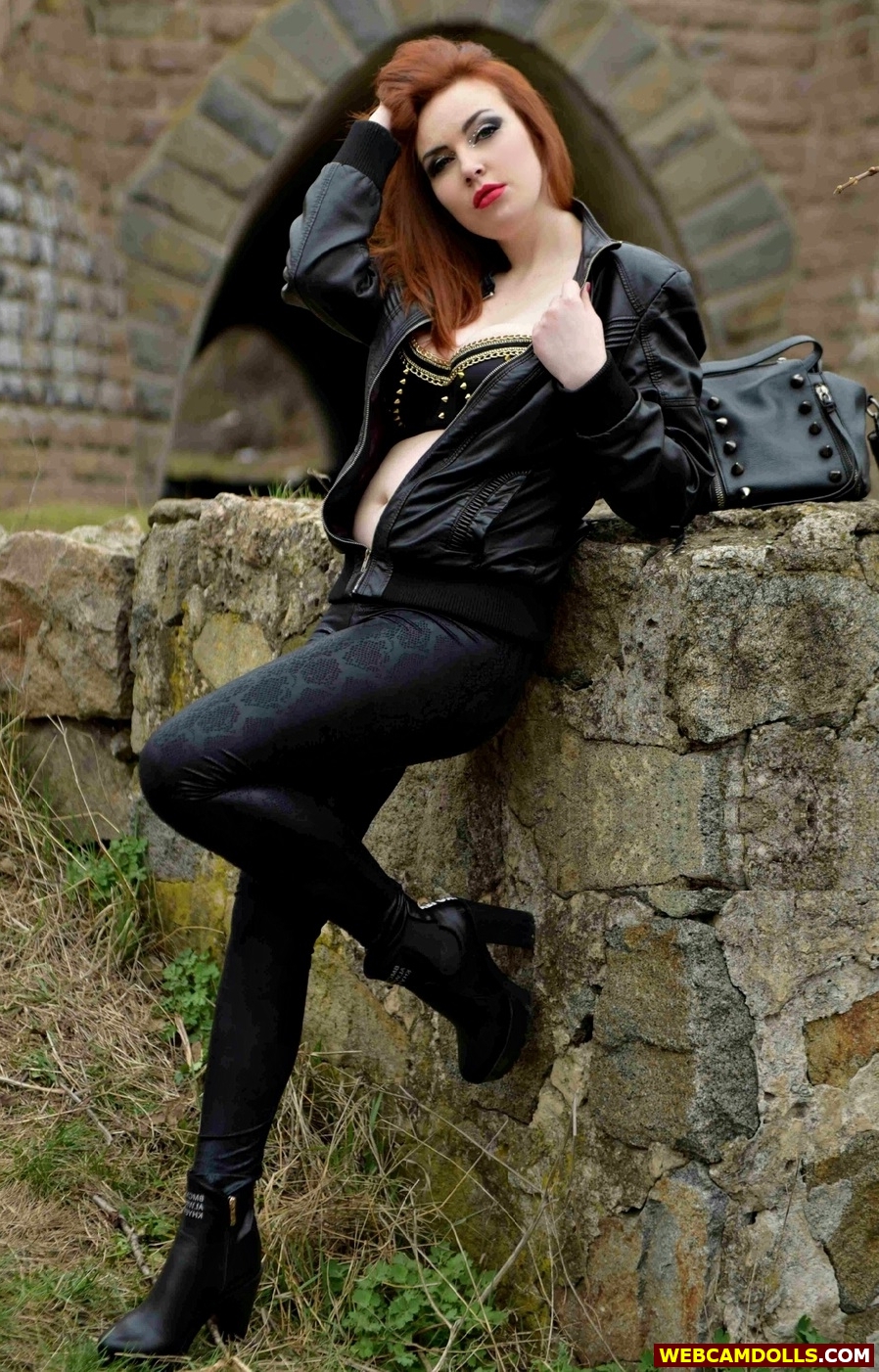 Redhead Girl in Black Leather Jacket and Black Pants on Webcamdolls